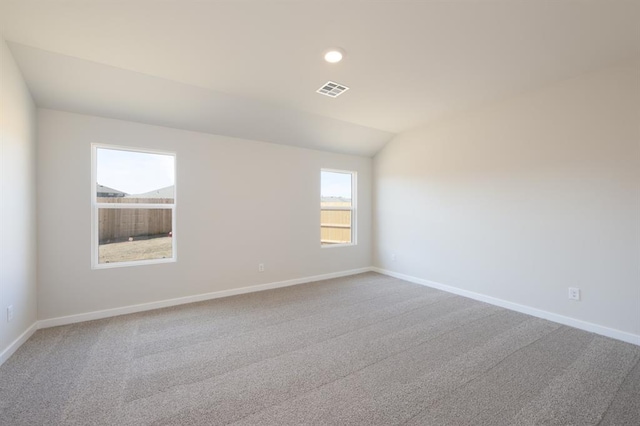 10324 NW 28th St, Yukon, OK 73099 - carpeted empty room with baseboards, vaulted ceiling, and recessed lighting