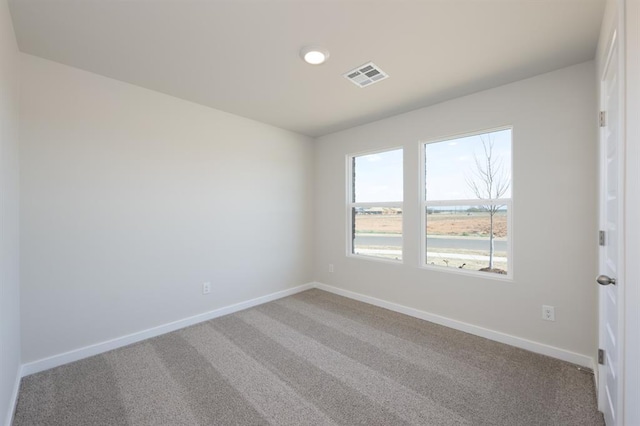 10324 NW 28th St, Yukon, OK 73099 - carpeted spare room featuring baseboards