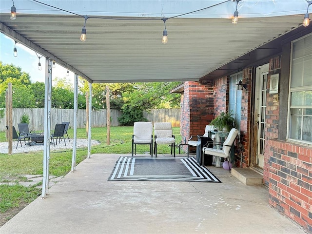 view of patio featuring an outdoor fire pit