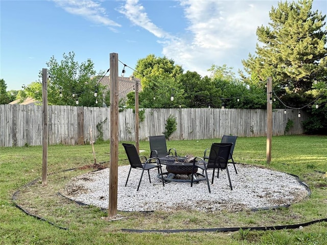 view of patio / terrace featuring an outdoor fire pit