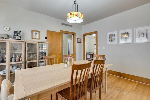 2534 NW 19th St, Oklahoma City, OK 73107 - dining space with light wood-type flooring and baseboards