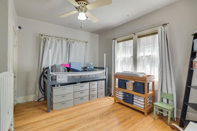 2534 NW 19th St, Oklahoma City, OK 73107 - bedroom featuring wood finished floors and a ceiling fan