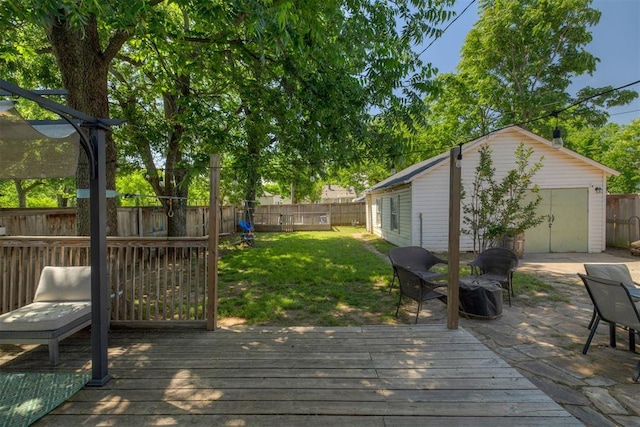 2534 NW 19th St, Oklahoma City, OK 73107 - deck with an outdoor structure and a garage