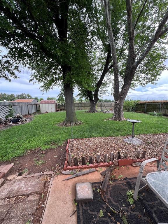 4125 Overland Dr, Del City, OK 73115 - view of yard with a shed and an outbuilding