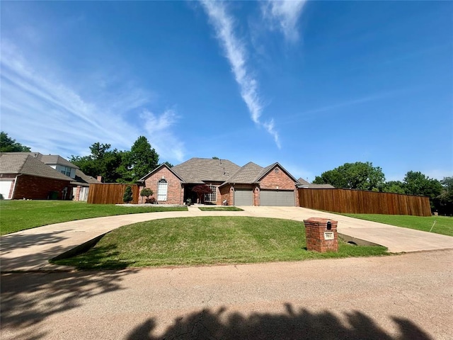 9817 Horseshoe Rd, Oklahoma City, OK 73162 - view of front facade featuring driveway, a garage, and brick siding