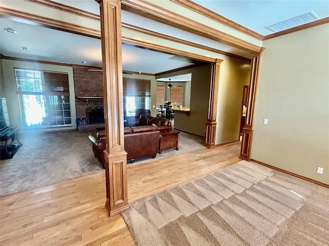 9817 Horseshoe Rd, Oklahoma City, OK 73162 - corridor featuring crown molding, light wood-style floors, and baseboards