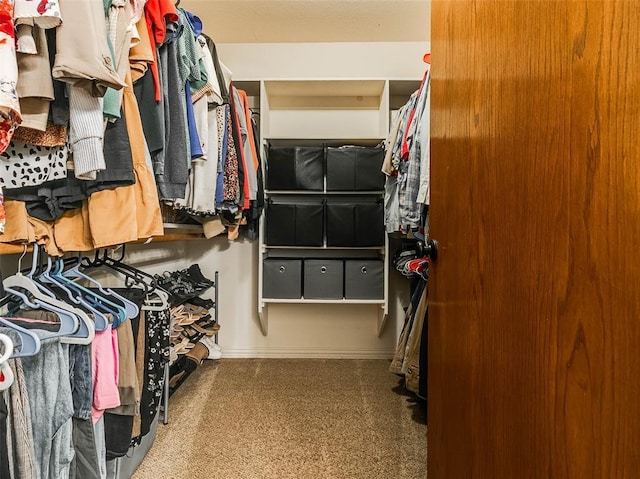 1015 N 3rd Ave, Stroud, OK 74079 - walk in closet featuring carpet floors