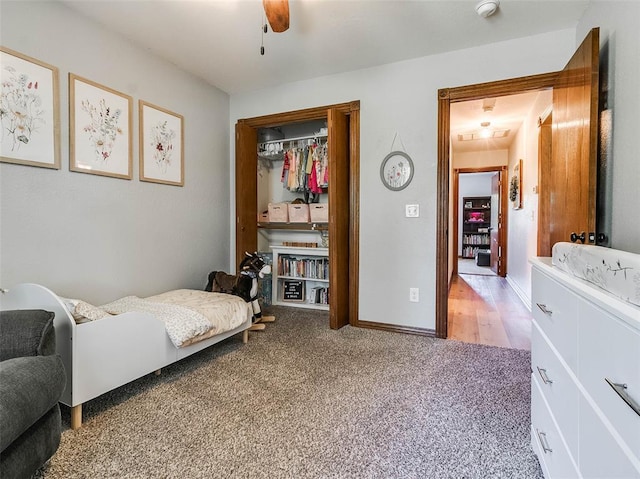 1015 N 3rd Ave, Stroud, OK 74079 - bedroom featuring light carpet, a closet, a ceiling fan, and baseboards