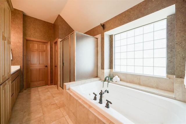 10681 NW 107th St, Yukon, OK 73099 - full bathroom featuring a shower stall, a tub with jets, vanity, and tile patterned flooring