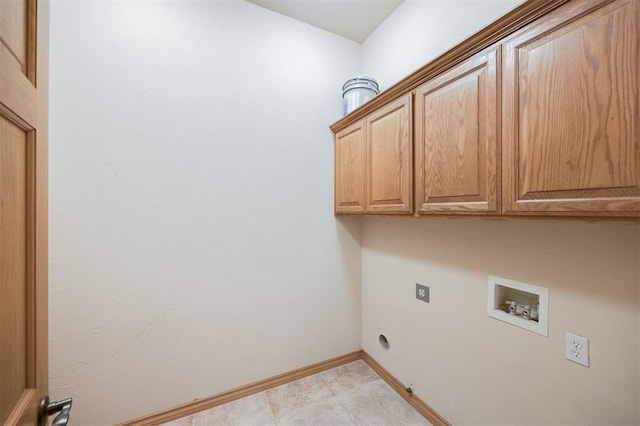 10681 NW 107th St, Yukon, OK 73099 - clothes washing area featuring cabinet space, hookup for a washing machine, baseboards, and electric dryer hookup