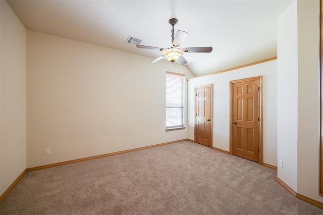 10681 NW 107th St, Yukon, OK 73099 - carpeted spare room featuring a ceiling fan, baseboards, and vaulted ceiling