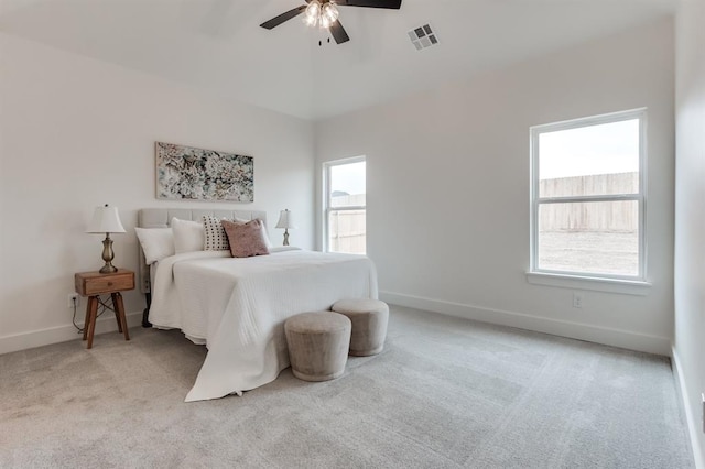 11616 NW 106th St, Yukon, OK 73099 - bedroom with light colored carpet, baseboards, and ceiling fan