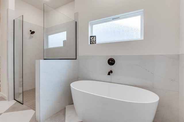 11616 NW 106th St, Yukon, OK 73099 - full bath with tile walls, a freestanding tub, and walk in shower