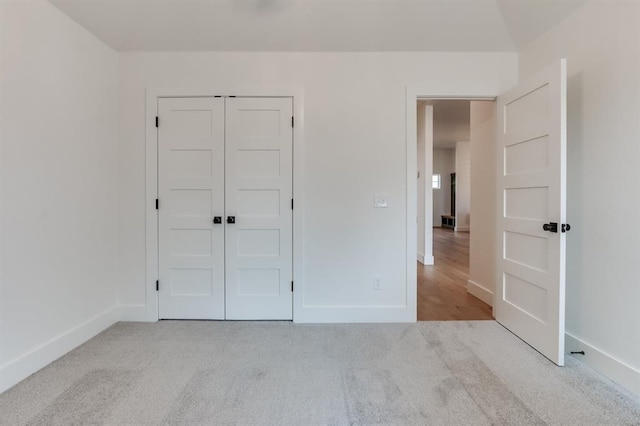 11616 NW 106th St, Yukon, OK 73099 - unfurnished bedroom with carpet flooring, baseboards, and a closet