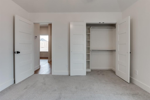 11616 NW 106th St, Yukon, OK 73099 - unfurnished bedroom with carpet, baseboards, and a closet