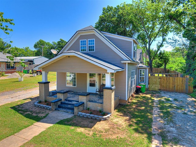 908 N Barta Ave, Prague, OK 74864 - bungalow featuring a porch