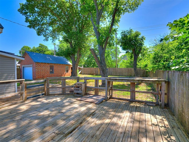 908 N Barta Ave, Prague, OK 74864 - wooden deck featuring a fenced backyard and an outdoor structure