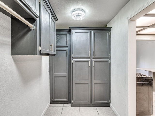 908 N Barta Ave, Prague, OK 74864 - walk in closet featuring light tile patterned floors