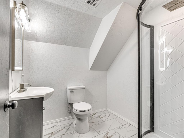 908 N Barta Ave, Prague, OK 74864 - bathroom with marble finish floors, a shower stall, toilet, baseboards, and a textured wall