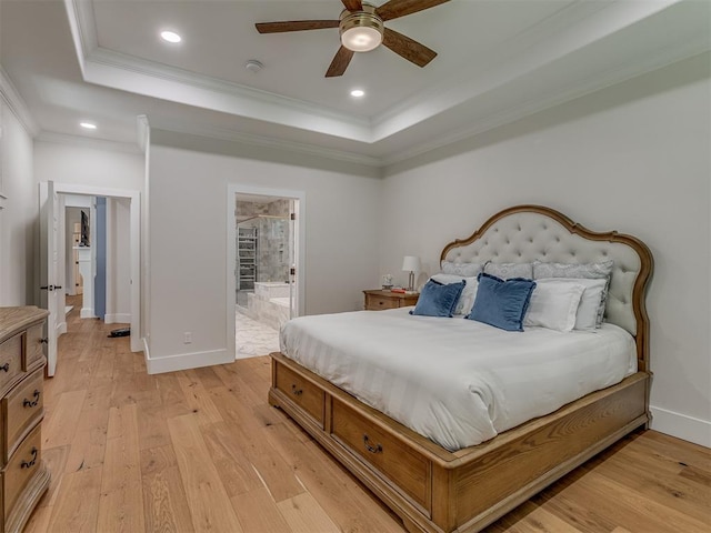 4300 High Range Ln, Edmond, OK 73034 - bedroom featuring ornamental molding, light wood-type flooring, a tray ceiling, recessed lighting, and baseboards
