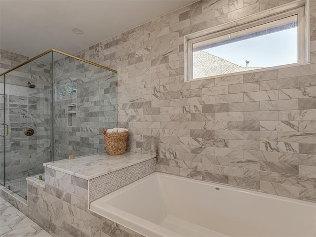 4300 High Range Ln, Edmond, OK 73034 - full bathroom featuring a tub, a shower stall, and marble look tiles