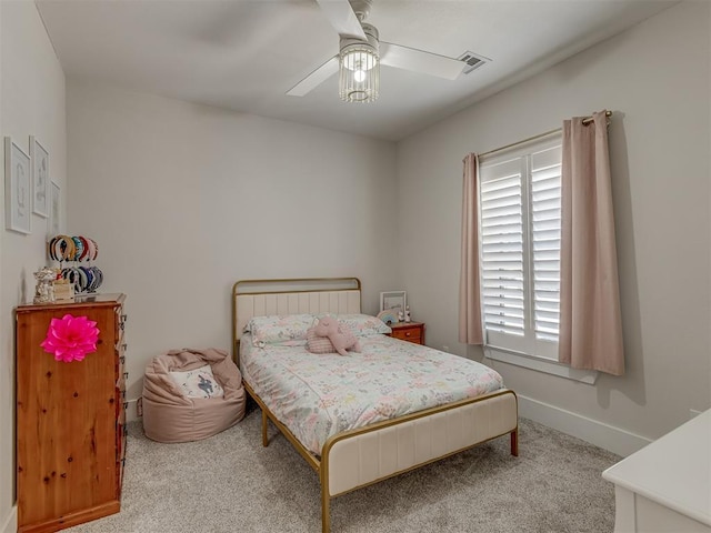 4300 High Range Ln, Edmond, OK 73034 - bedroom with carpet floors, a ceiling fan, and baseboards