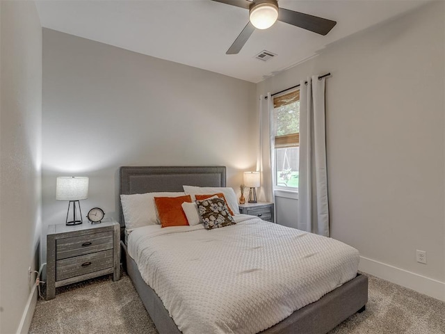 4300 High Range Ln, Edmond, OK 73034 - bedroom with carpet floors, baseboards, and a ceiling fan