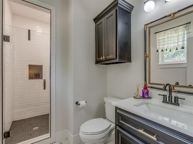 4300 High Range Ln, Edmond, OK 73034 - bathroom featuring toilet, a shower stall, vanity, and baseboards