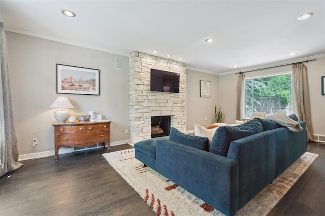 1109 Tedford Way, Nichols Hills, OK 73116 - living area featuring dark wood finished floors, crown molding, baseboards, recessed lighting, and a fireplace