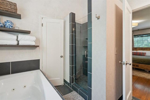 1109 Tedford Way, Nichols Hills, OK 73116 - full bath featuring a shower stall, ensuite bath, a whirlpool tub, and wood finished floors