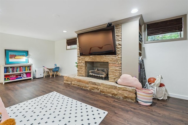 1109 Tedford Way, Nichols Hills, OK 73116 - living area with wood finished floors, a fireplace, recessed lighting, and baseboards