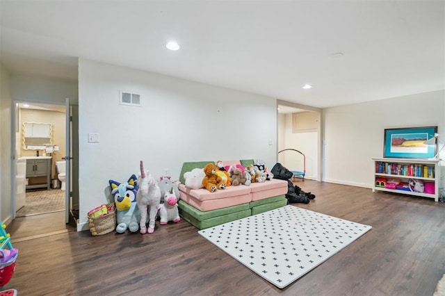 1109 Tedford Way, Nichols Hills, OK 73116 - recreation room with wood finished floors, recessed lighting, and baseboards