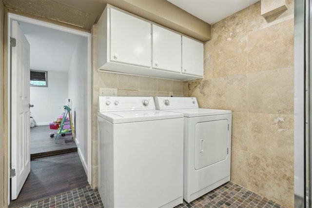 1109 Tedford Way, Nichols Hills, OK 73116 - washroom featuring washer and dryer, tile walls, and cabinet space