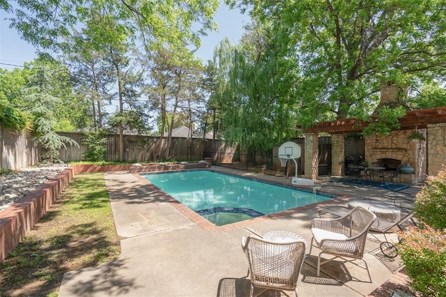 1109 Tedford Way, Nichols Hills, OK 73116 - view of swimming pool featuring a patio, a fenced backyard, and a pool with connected hot tub