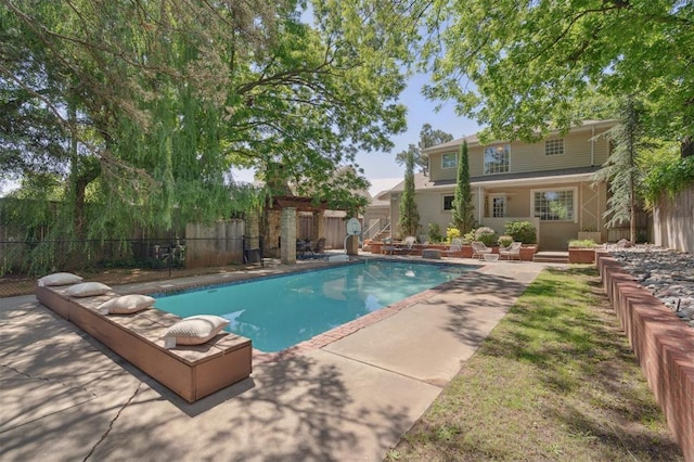 1109 Tedford Way, Nichols Hills, OK 73116 - view of pool with a water slide, a patio area, and a fenced backyard