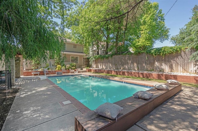 1109 Tedford Way, Nichols Hills, OK 73116 - view of pool with a fenced backyard and a patio