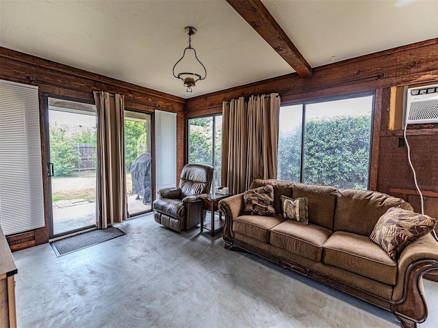 1515 S Reno Ave, El Reno, OK 73036 - living area with finished concrete flooring and beam ceiling