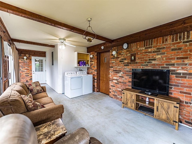 1515 S Reno Ave, El Reno, OK 73036 - living area featuring washing machine and clothes dryer, carpet floors, beamed ceiling, ceiling fan, and brick wall