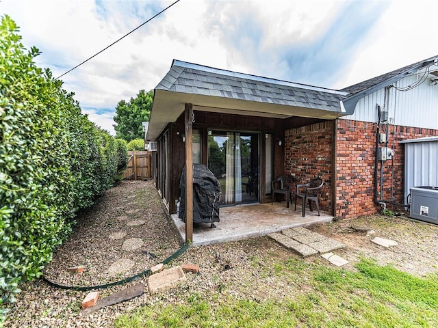 1515 S Reno Ave, El Reno, OK 73036 - view of patio / terrace with fence and area for grilling