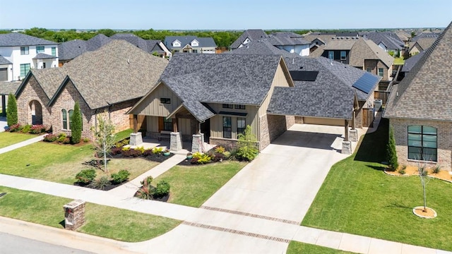 8421 NW 130th Ter, Oklahoma City, OK 73142 - view of front facade with roof with shingles, a residential view, and driveway