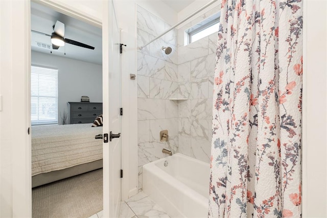 8421 NW 130th Ter, Oklahoma City, OK 73142 - ensuite bathroom featuring shower / bath combination with curtain, healthy amount of natural light, and marble finish floors