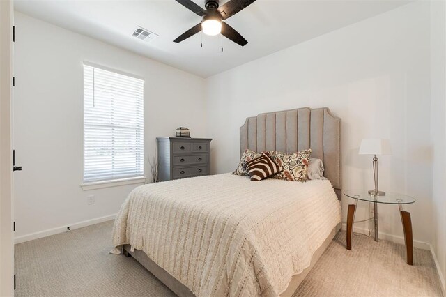 8421 NW 130th Ter, Oklahoma City, OK 73142 - bedroom featuring light colored carpet, baseboards, and ceiling fan