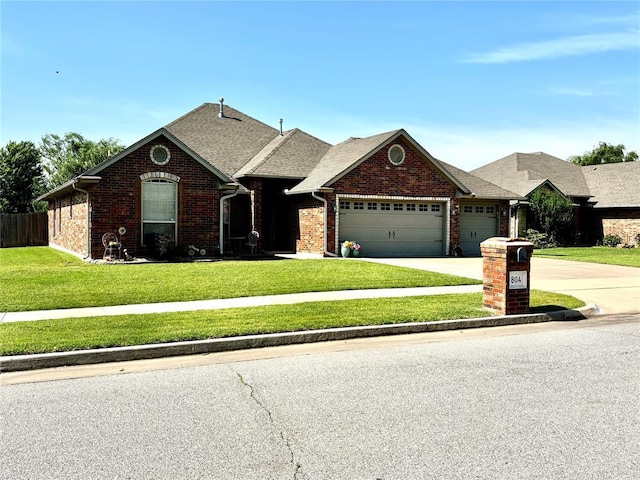 view of front of house featuring an attached garage, concrete driveway, brick siding, and roof with shingles