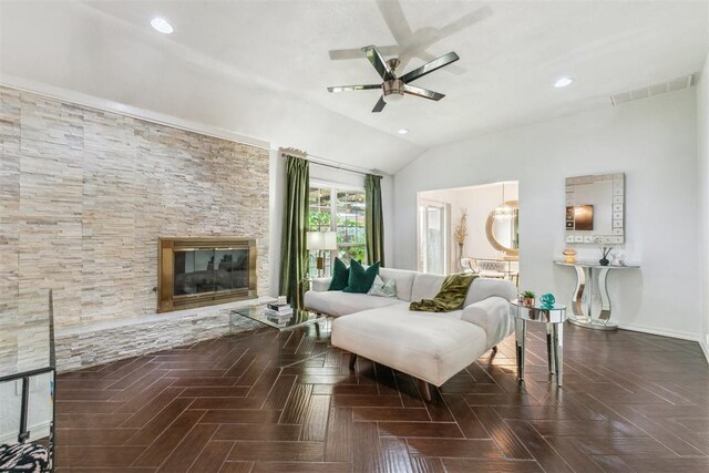 1712 De Vita Rd, Edmond, OK 73003 - living room featuring a fireplace, a ceiling fan, vaulted ceiling, recessed lighting, and baseboards