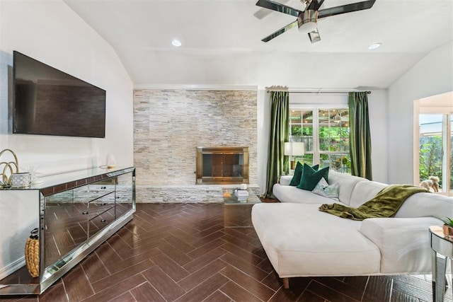 1712 De Vita Rd, Edmond, OK 73003 - living room with lofted ceiling, a fireplace, and a ceiling fan