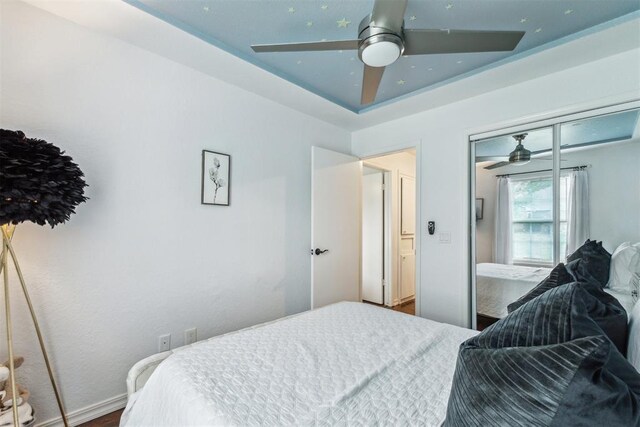 1712 De Vita Rd, Edmond, OK 73003 - bedroom with a closet and ceiling fan