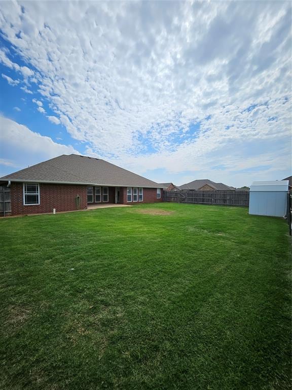 1801 Caribou St, Altus, OK 73521 - view of yard featuring an outbuilding