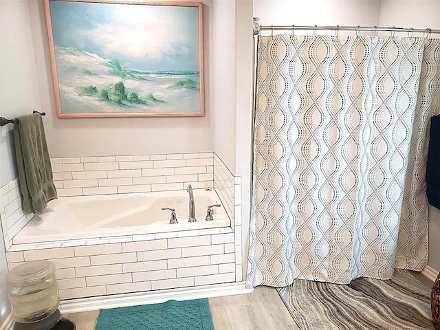 14452 Ns 3630th Rd, Sasakwa, OK 74867 - full bathroom featuring a bath, a shower with shower curtain, and wood finished floors