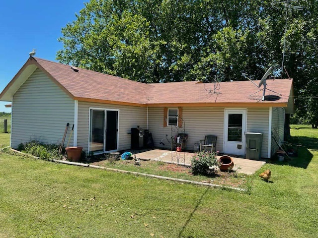 14452 Ns 3630th Rd, Sasakwa, OK 74867 - back of house with a patio, a lawn, and roof with shingles