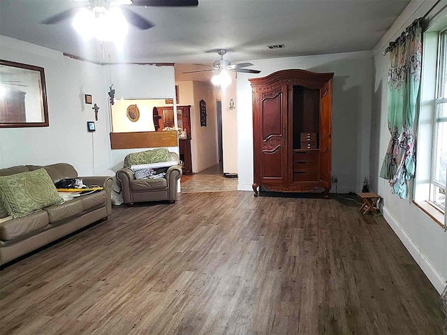 14452 Ns 3630th Rd, Sasakwa, OK 74867 - living room featuring a ceiling fan, wood finished floors, and baseboards